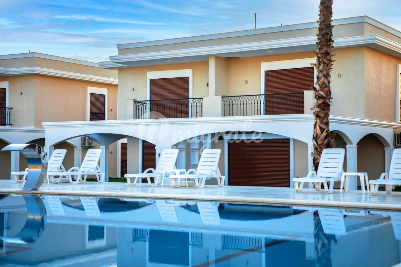 Элитные таунхаусы и виллы на Лонг-Бич в Кушадасы (Assilem villas Kusadasi)