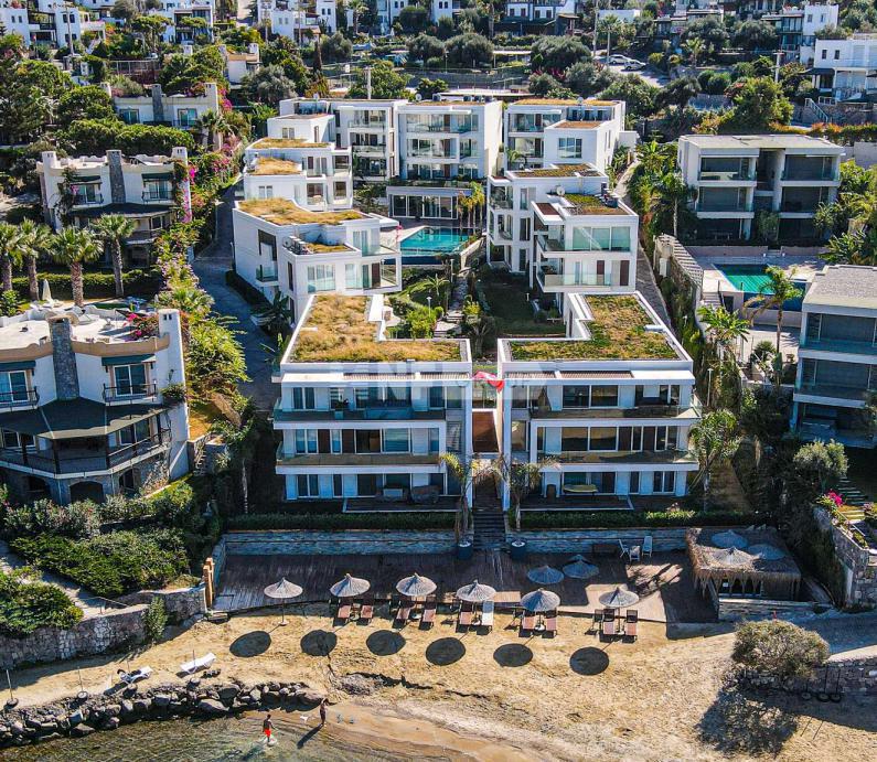 Элитные апартаменты с частным пляжем в Бодруме