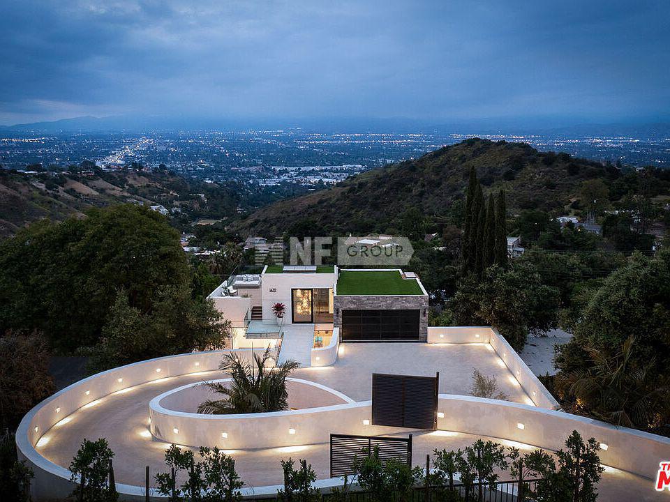 Роскошный дом на вершине горы в Лос-Анджелесе (14319 Mulholland Dr, Los Angeles, CA 90077)